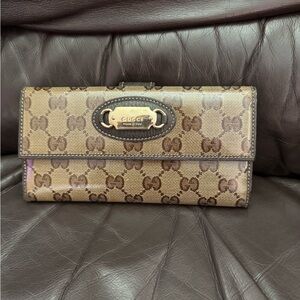 Gucci Brown Monogram Coated Wallet